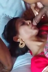 The girl in a saree gives an Indian blowjob and eats cum