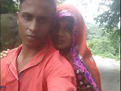 caught-couple-outdoor-village